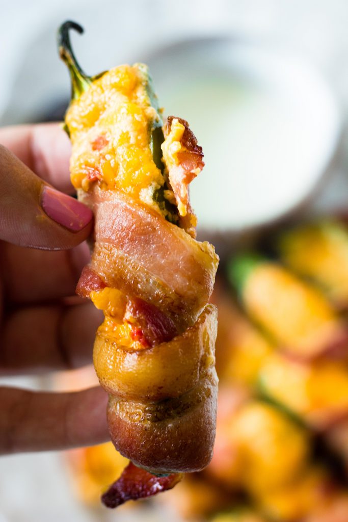 These keto jalapeño poppers are not your average keto snack. Pimento cheese steals the show in this 3 ingredient keto jalapeno popper recipe.