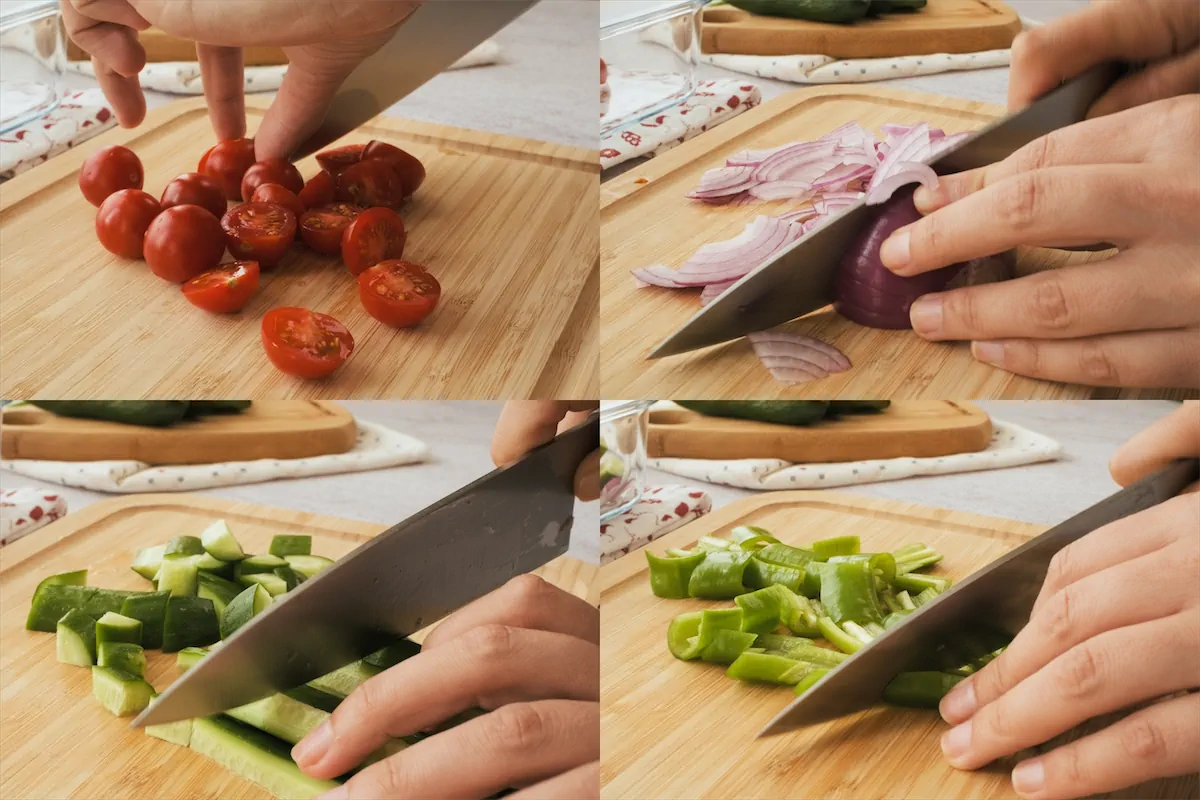 Chopping cherry tomatoes, sweet green peppers, Persian cucumbers, and onion.