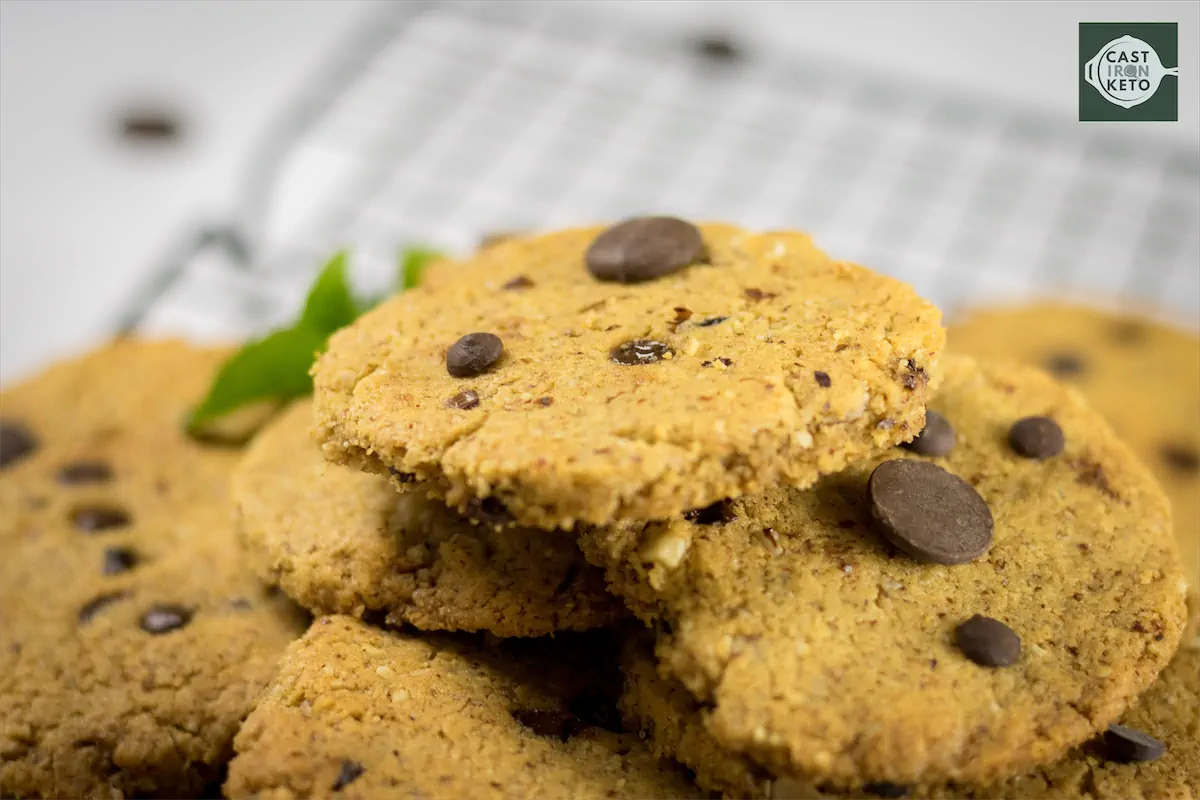 Cookies with chocolate chips stacked on one another.