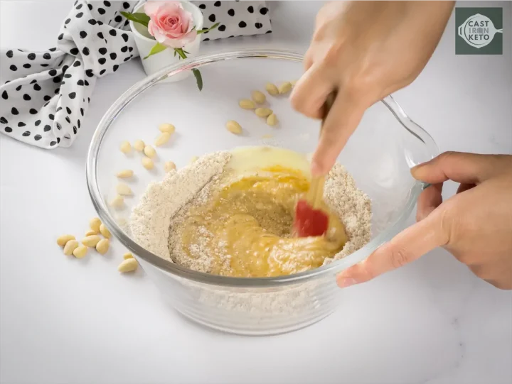 Stirring the ingredients in a large bowl.