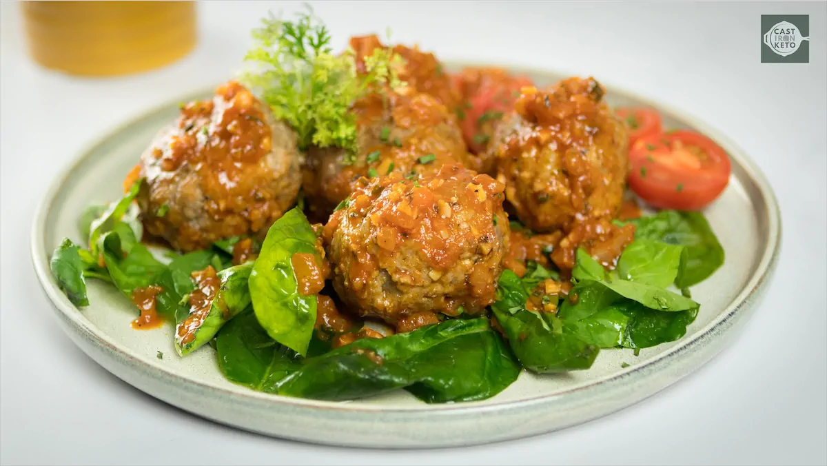 Freshly prepared keto meatballs on a plate.