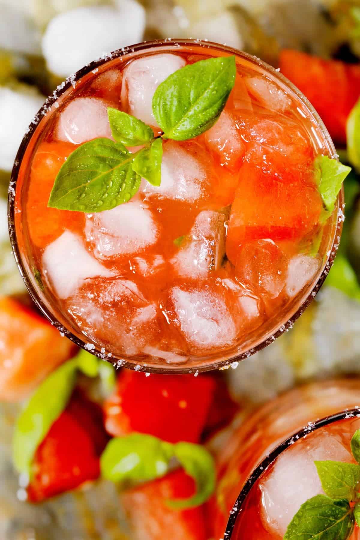 A top-down shot of basil watermelon-infused water.