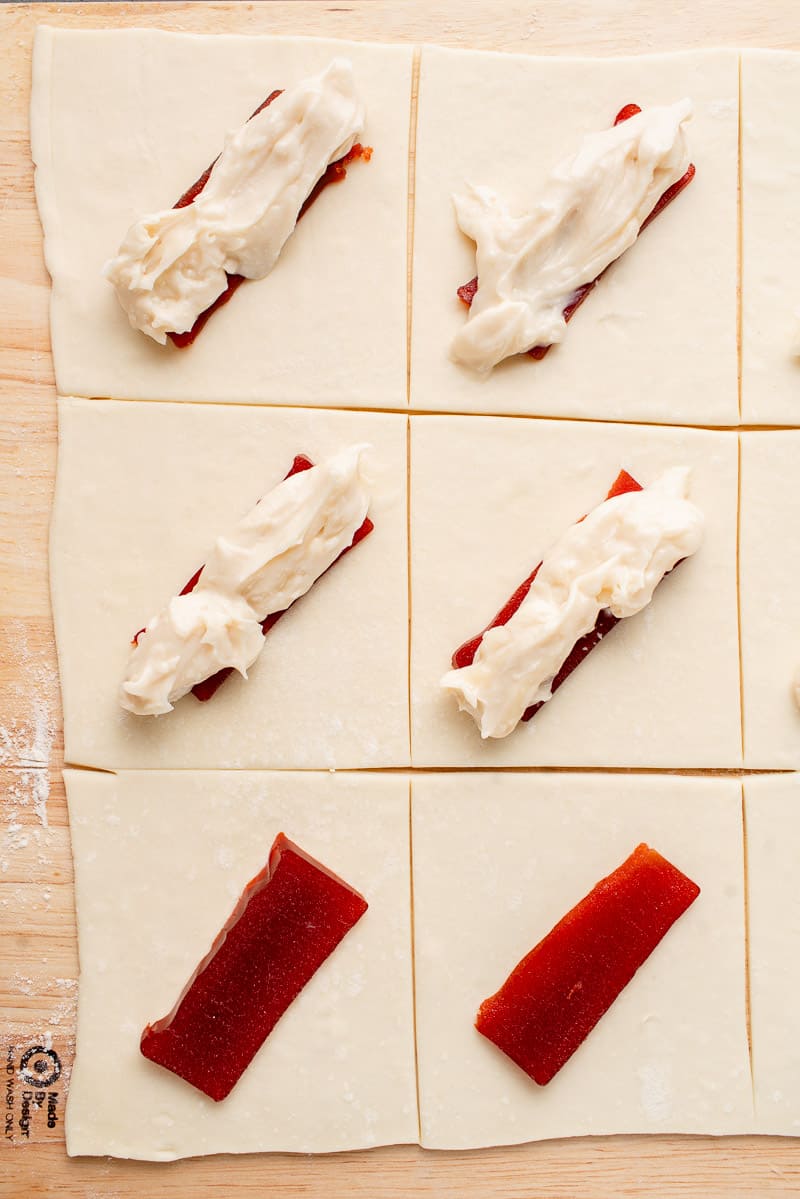 puffed pastry squares filled with cream cheese and guava