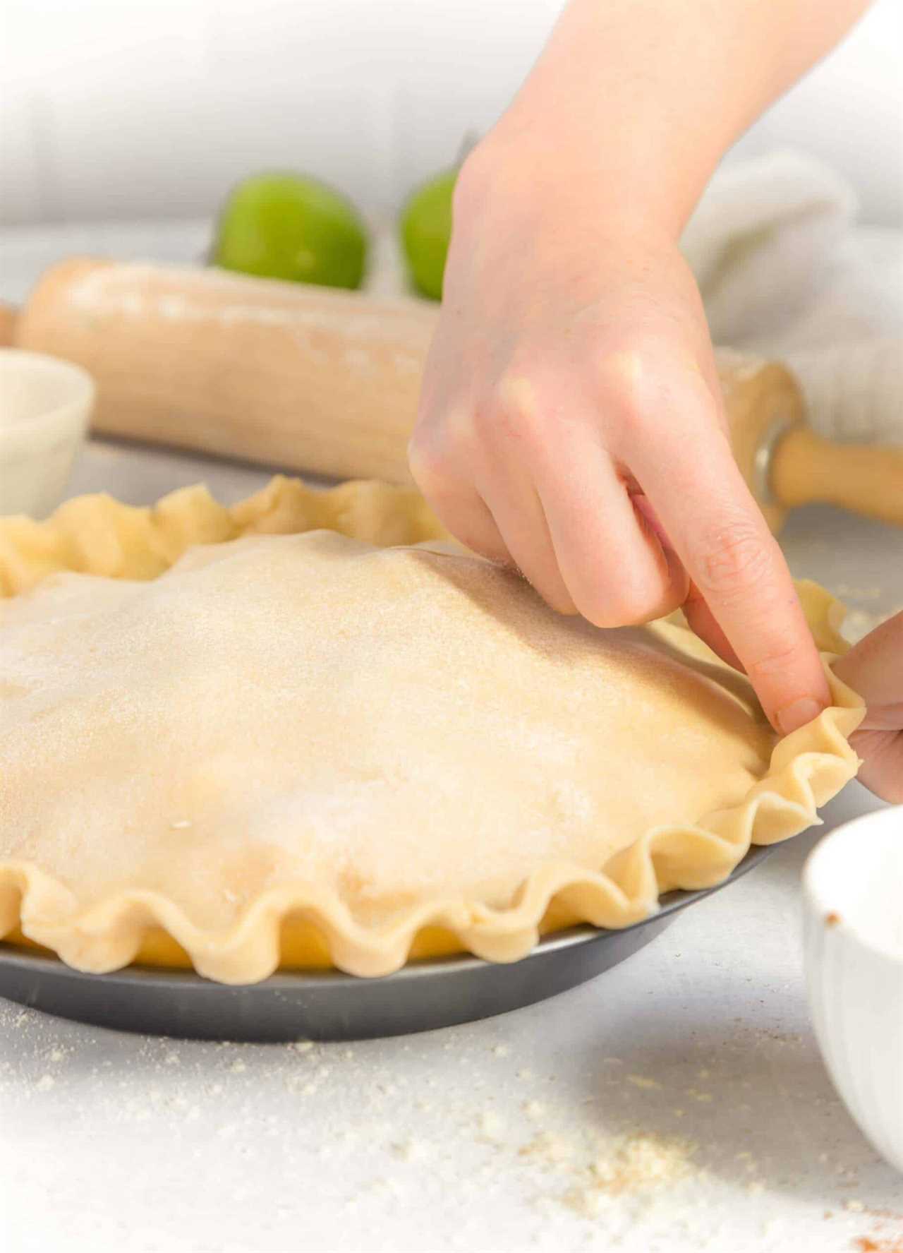 How to Shape Apple Pie Crust Hand Pinching Edges