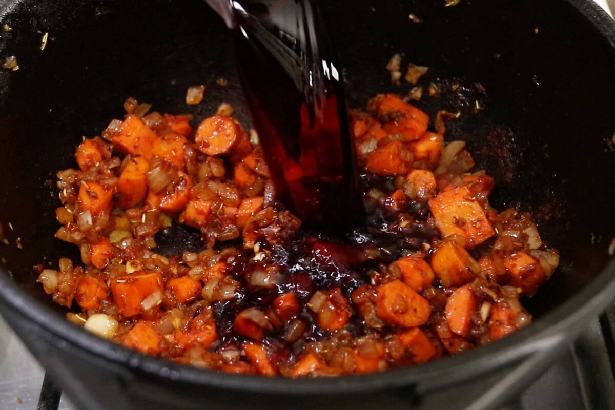 step by step - wine being added into vegetables