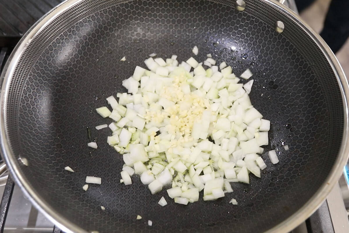 step by step - garlic and onion in a pan