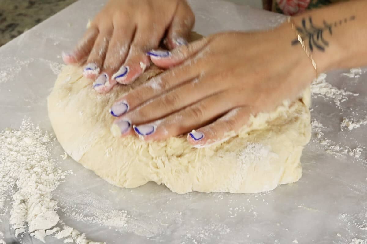 kneading ube cinnamon roll dough