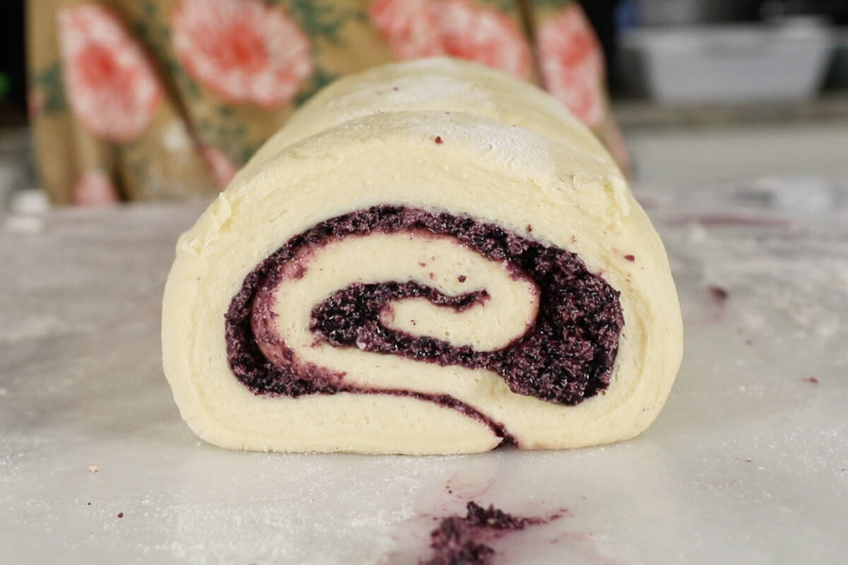 sliced ube cinnamon rolls before baking