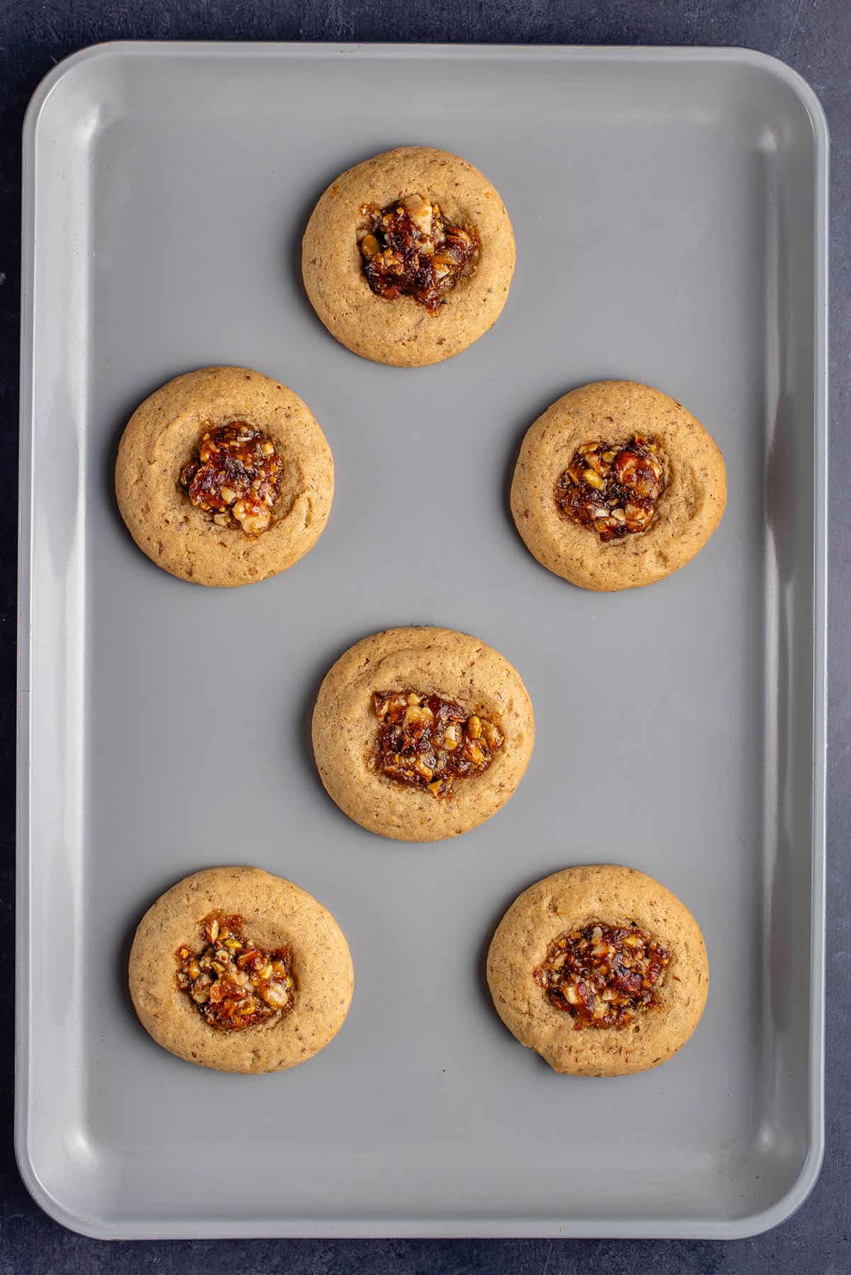 cooked baklava cookies on a baking sheet