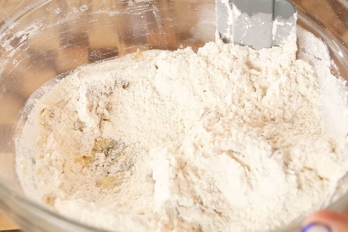 dough being mixed in a bowl