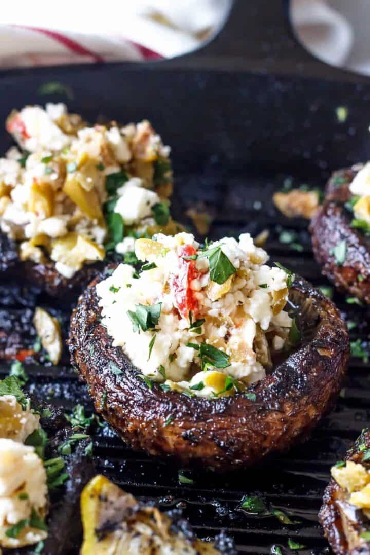 Keto Mediterranean Stuffed Mushrooms in skillet