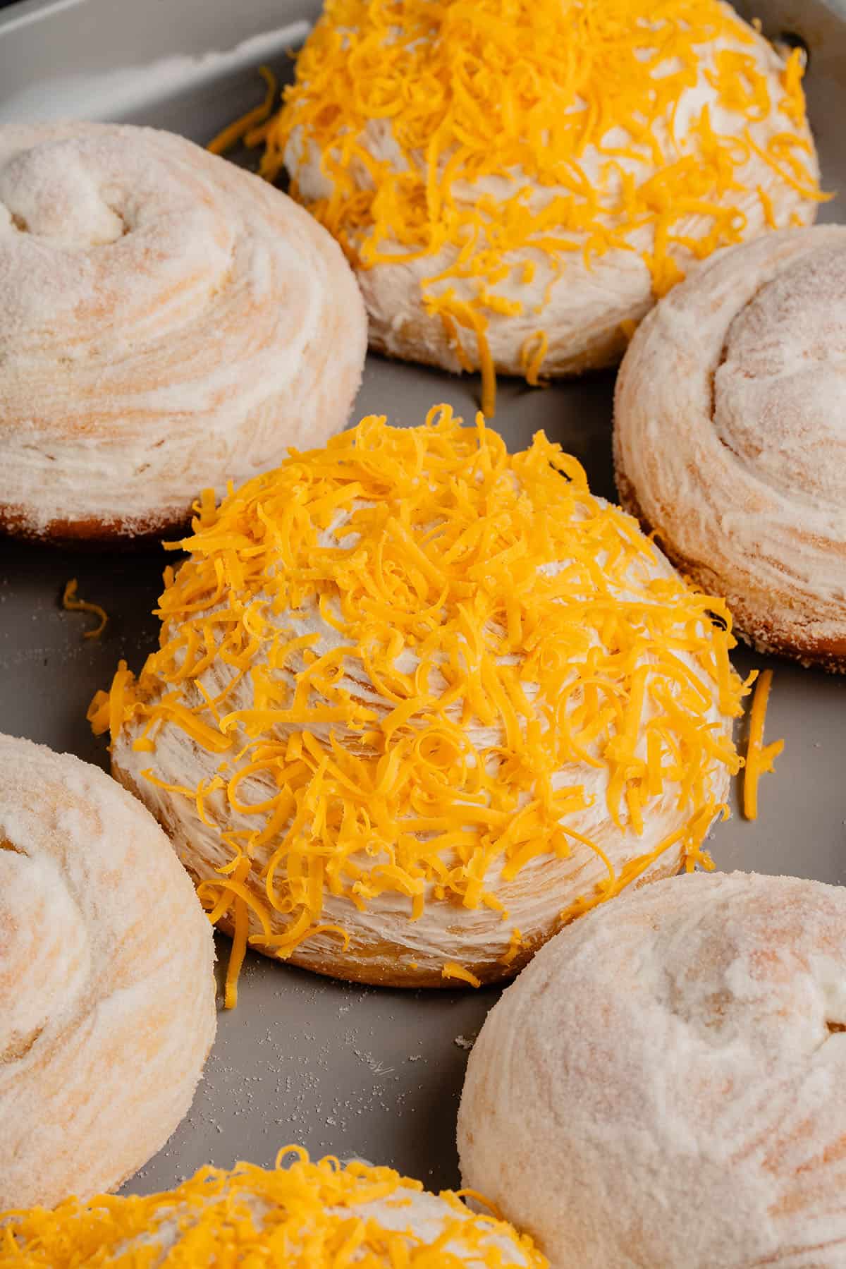 close up of Vegan Ensaymada (Sweet Filipino brioche) with cheese