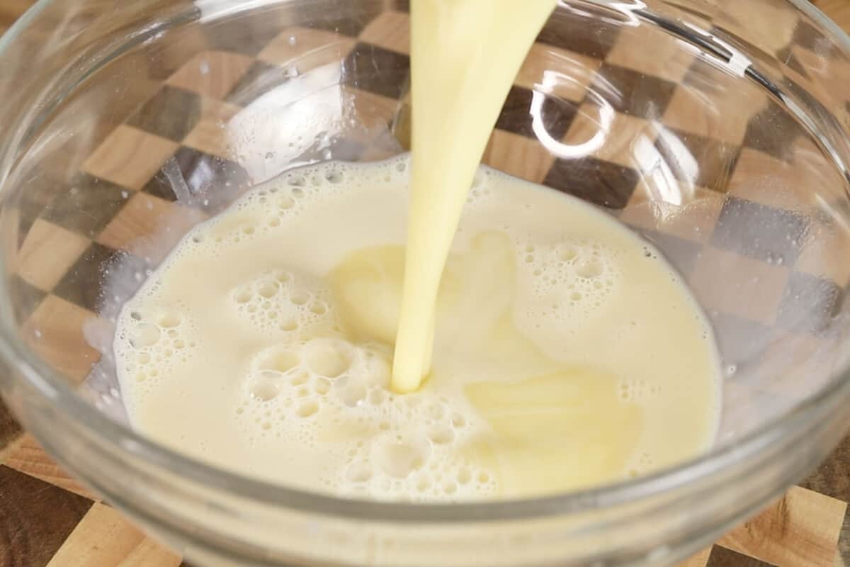 making vegan ensaymada dough in glass bowl