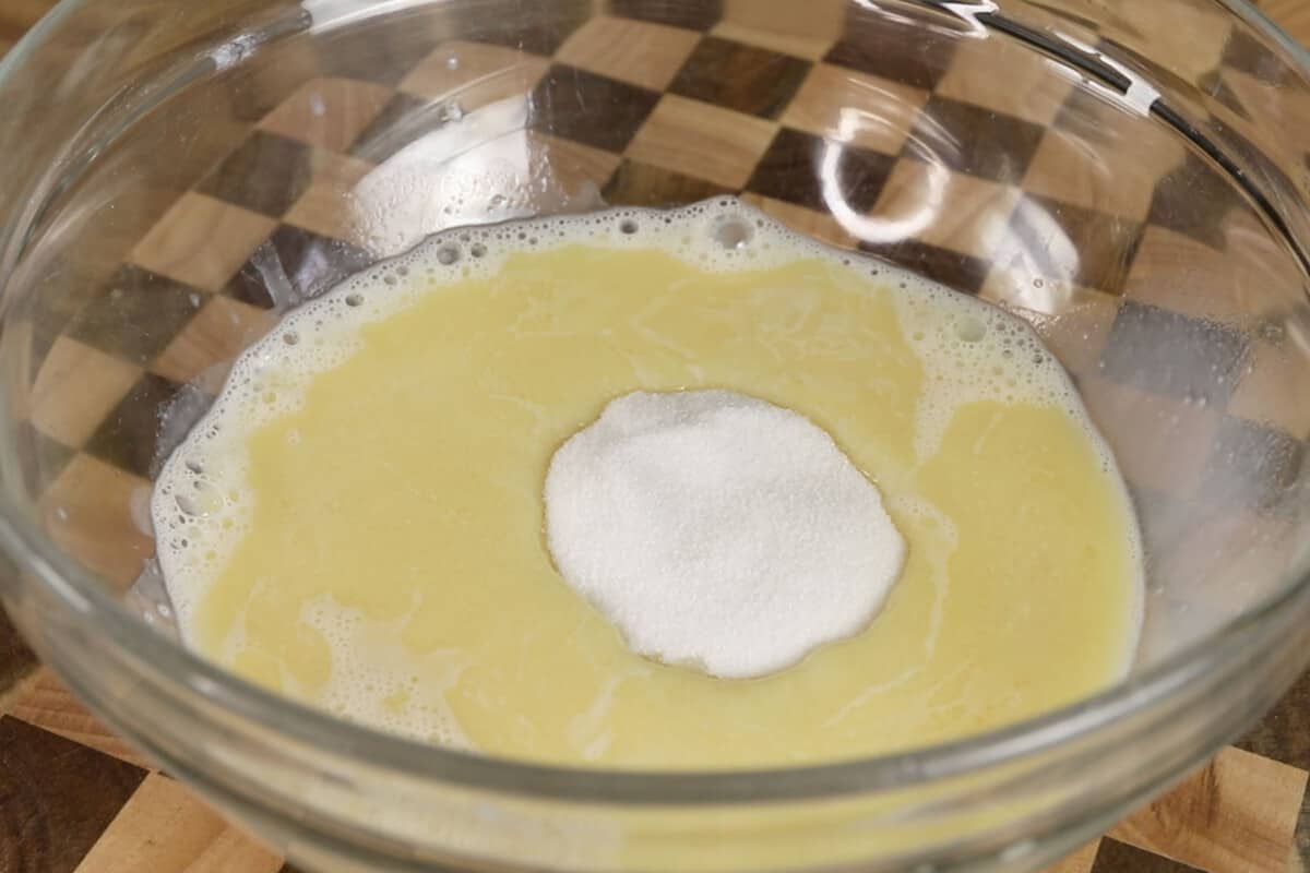 making vegan ensaymada dough in glass bowl