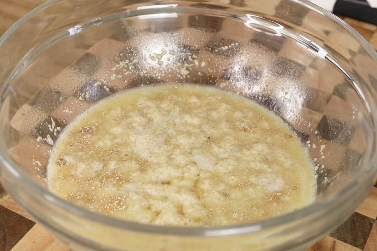 making vegan ensaymada dough in glass bowl