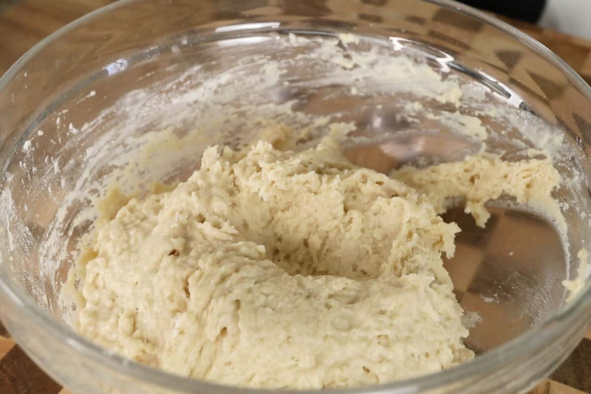 making vegan ensaymada dough in glass bowl