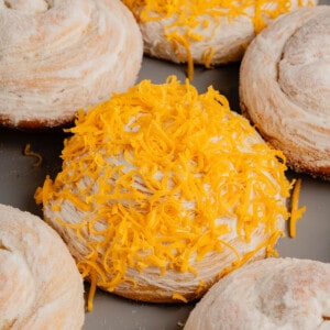 close up of Vegan Ensaymada (Sweet Filipino brioche) with cheese