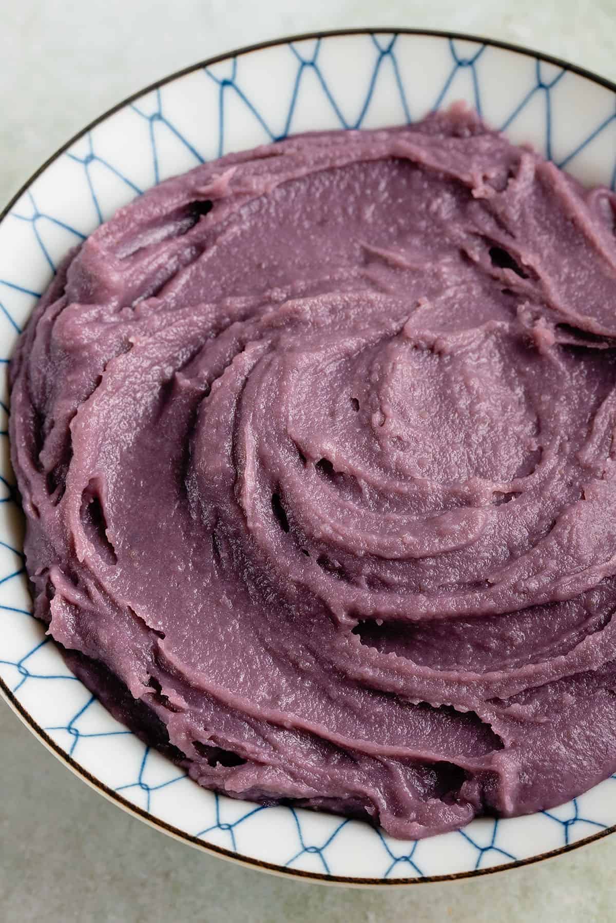 close up of bowl full of homemade ube halaya (filipino purple yam jam)