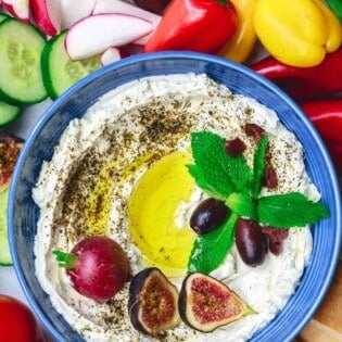 Homemade Labneh Recipe | The Mediterranean Dish. Homemade labneh, Middle Eastern yogurt cheese that is tangy, creamy and lighter than your average cream cheese. Use it as mezze or to spread on your favorite bread. Versatile and super easy to make! A two-step recipe from TheMediterraneanDish.com