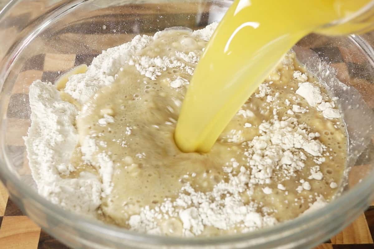 making vegan Hawaiian bread dough in glass bowl