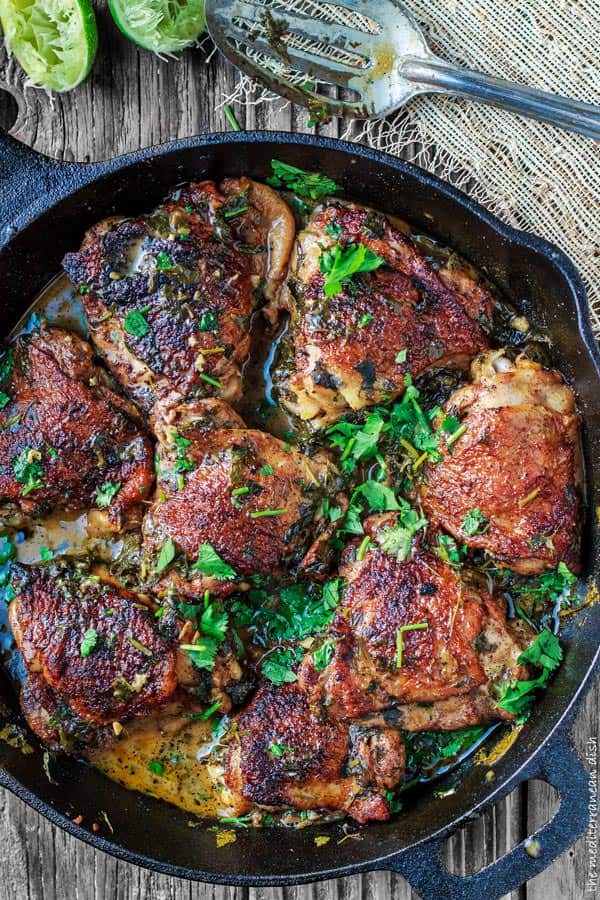 Cilantro-Lime Chicken Thighs Recipe from The Mediterranean Dish. Perfectly flavored fall-off-the bone tender! This chicken recipe has quickly become a family favorite! Recipe comes with step-by-step photos.