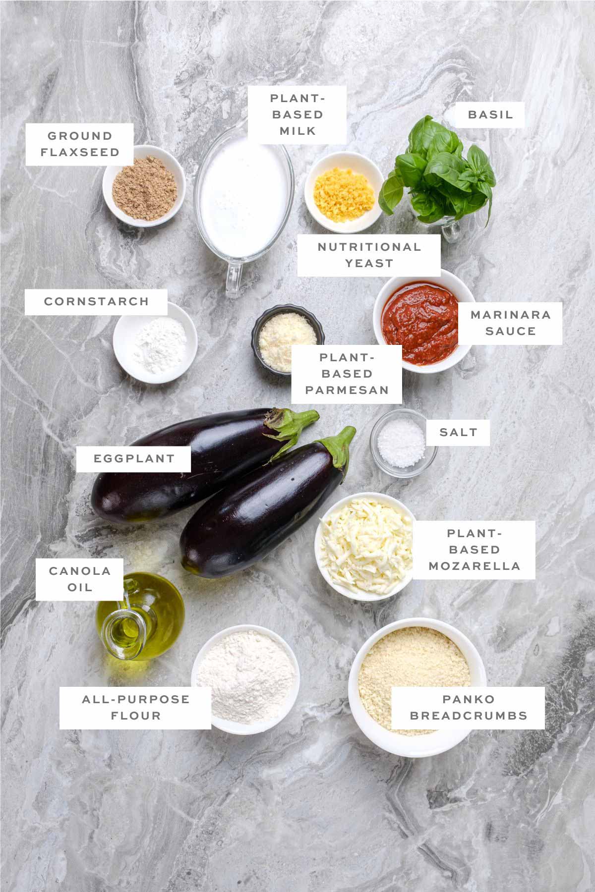 Ingredients for vegan eggplant parmesan, with labels.