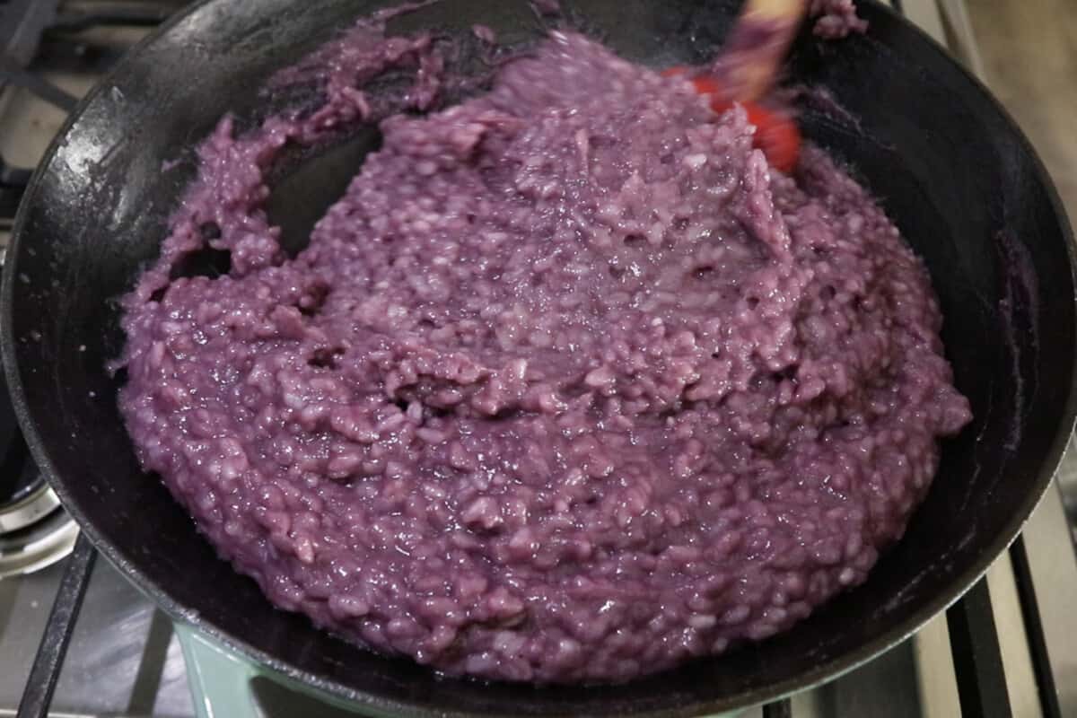 step by step: mixing ube rice in wok