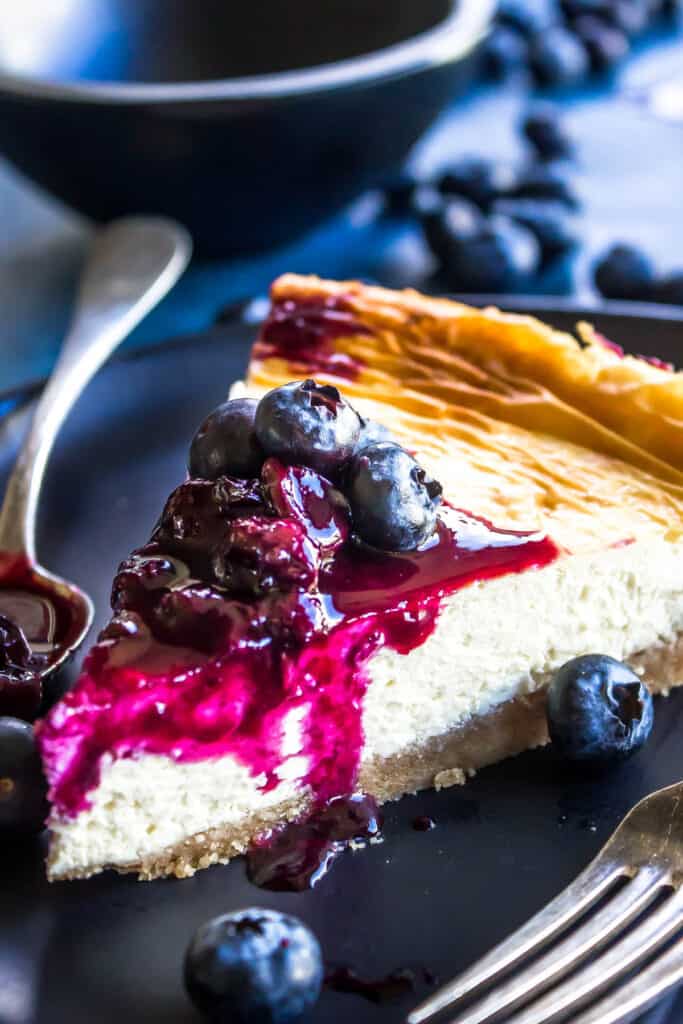 Keto Cheesecake covered with a homemade blueberry preserve